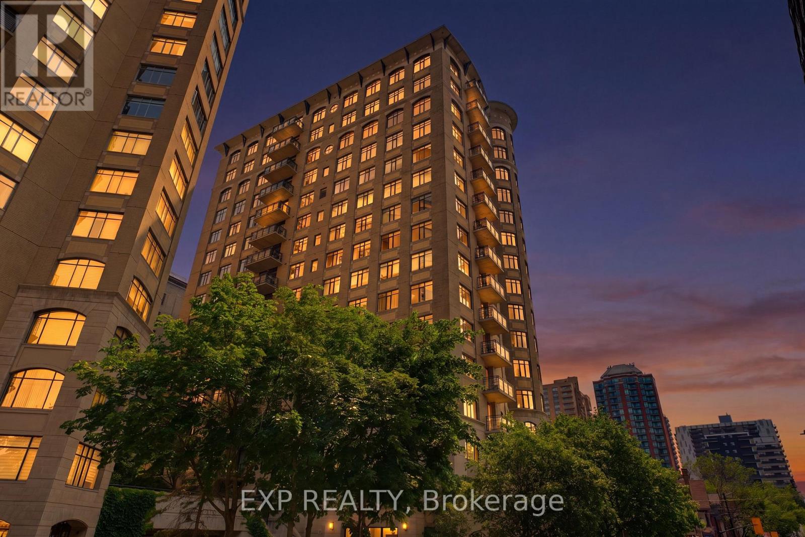 Twilight Exterior of The Gardens condominium.