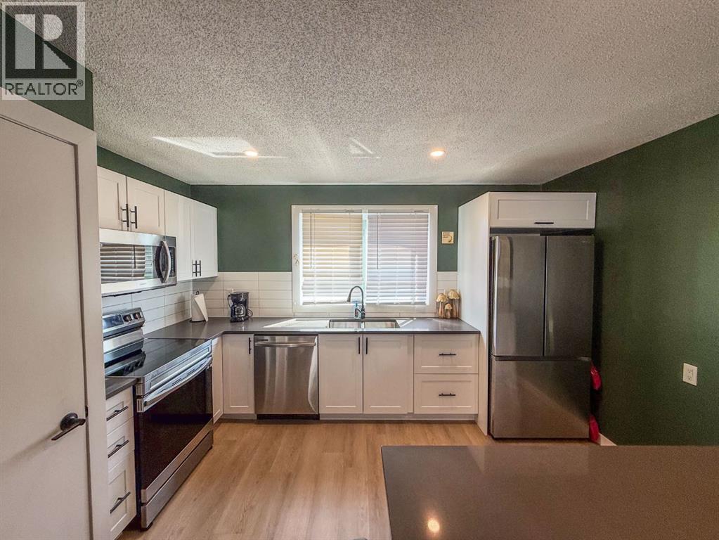 119 Fallswater Crescent NE, Falconridge, Calgary photo 3