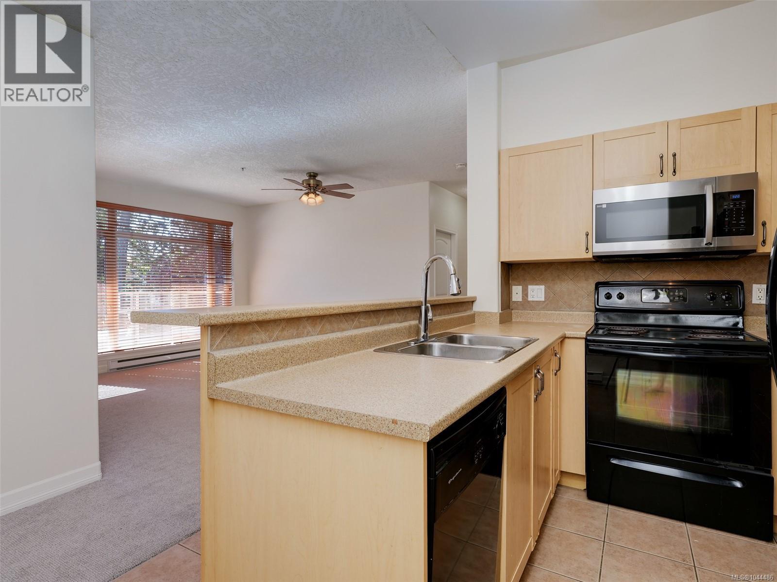 #203 2706 Peatt Rd - Image 13