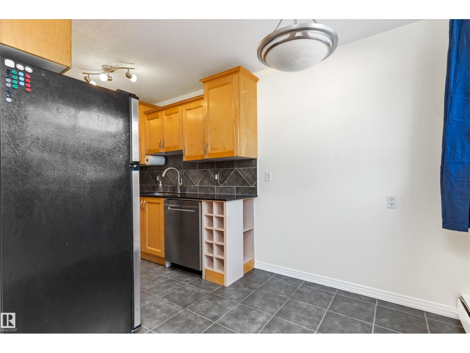 #102 10720 84 AV NW - 10