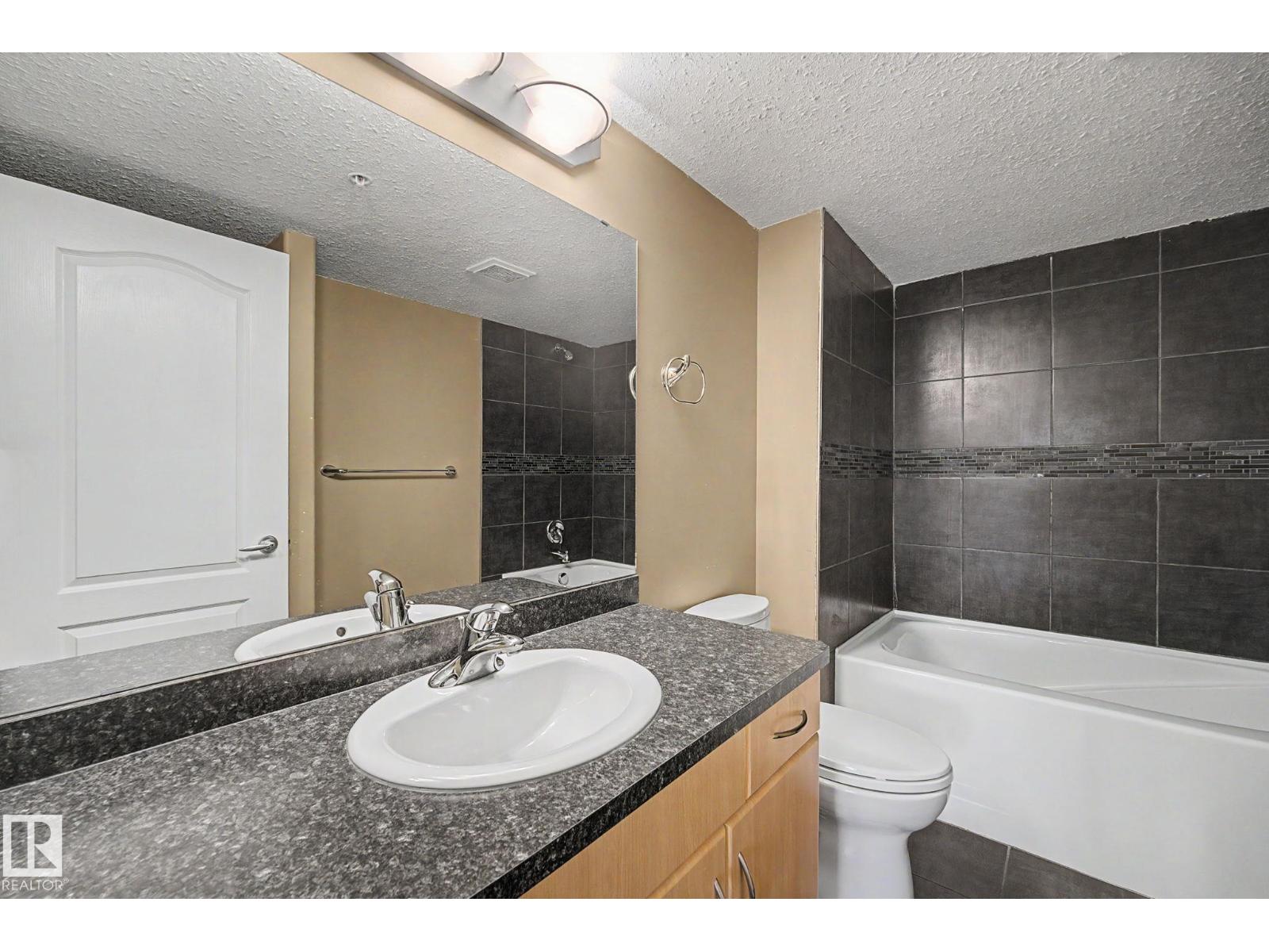 #338 278 SUDER GREENS DR SW NW - 27