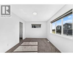 Family room - 227, 137 Red Embers Link Ne, Calgary, AB T3N2G4 Photo 18