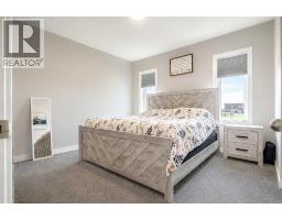 Family room - 1614 2 Avenue E, Brooks, AB T1R1K3 Photo 6