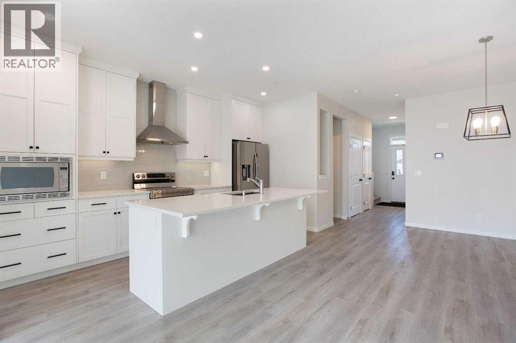 112 Lucas Street NW, Livingston, Calgary photo 4