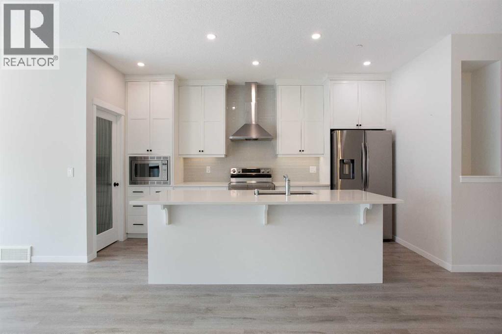 112 Lucas Street NW, Livingston, Calgary photo 3