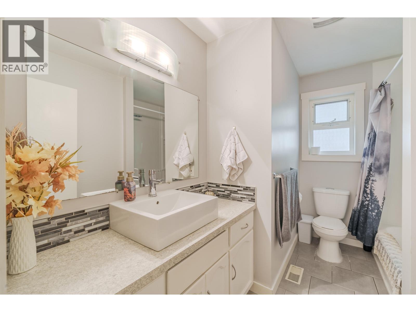 5423 KITSUM COURT, 108 Mile Ranch