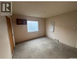 Living room - 310 High Street W, Moose Jaw, SK S6H1S9 Photo 11