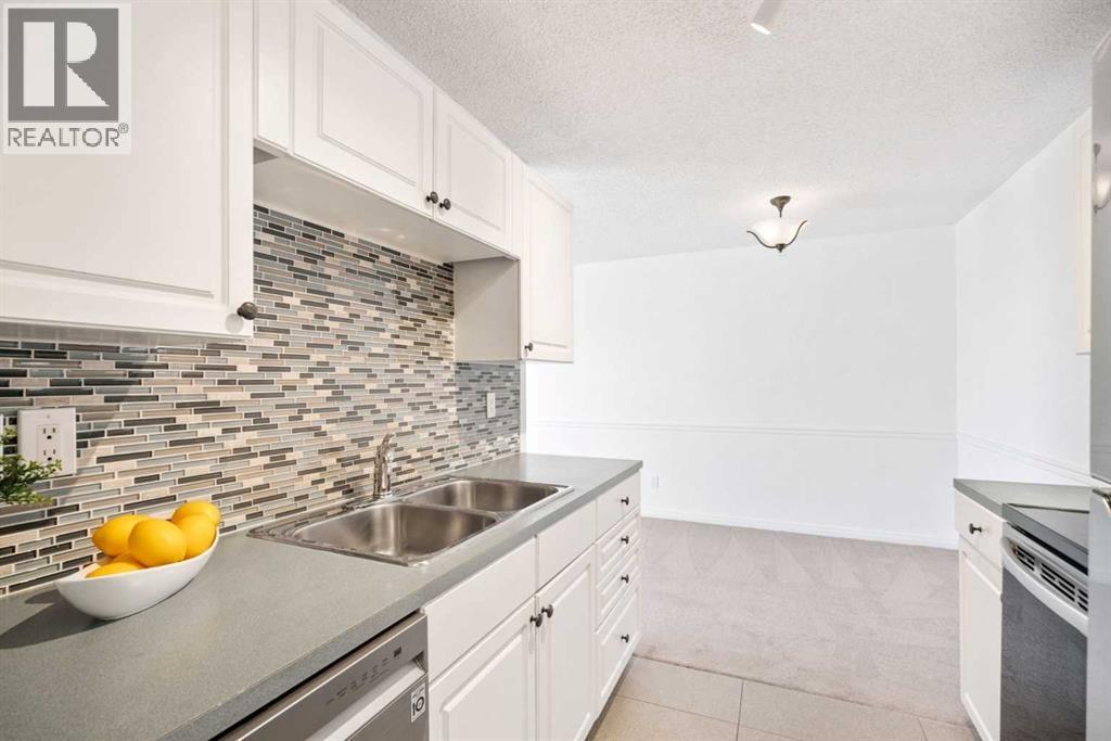 404, 1113 37 Street SW, Rosscarrock, Calgary photo 5