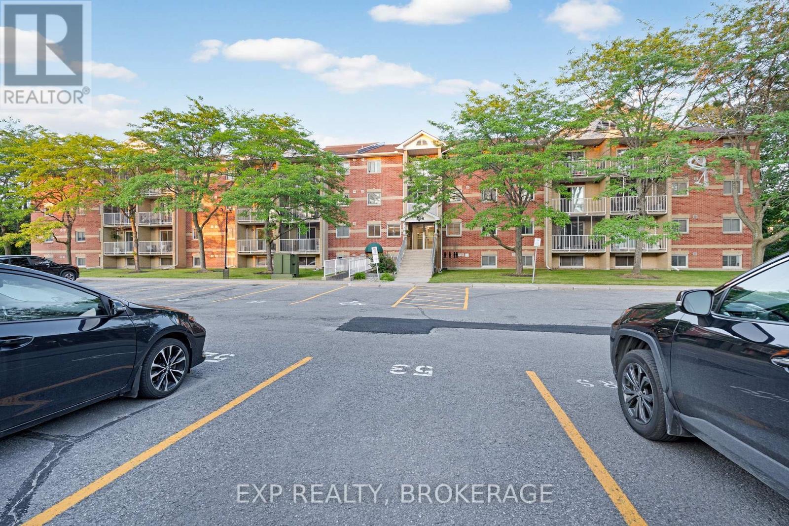 #101 316 KINGSDALE AVENUE - 1