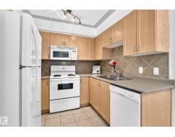 Laundry room - #105 9938 104 St Nw, Edmonton, AB T5K2X7 Photo 7