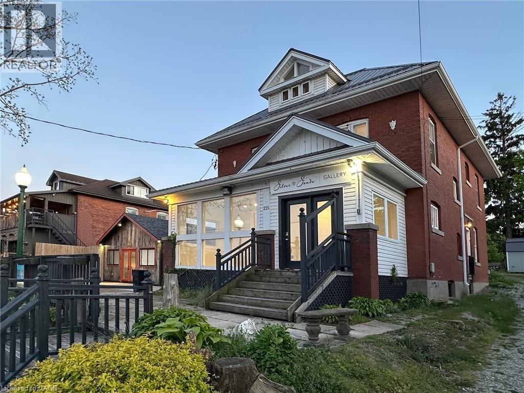 Parcel includes 2 buildings with 2 commercial unit and 1 residential