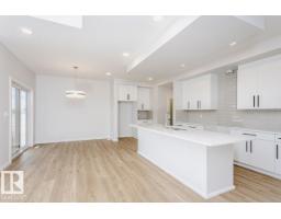 Great room - 17332 5th St Nw, Edmonton, AB T5Y6G4 Photo 7