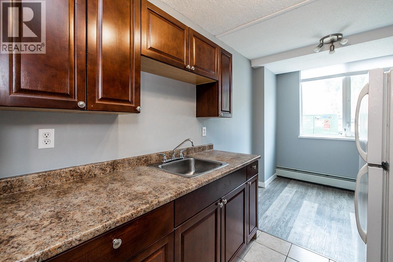 #106 1501 QUEENSWAY - 2