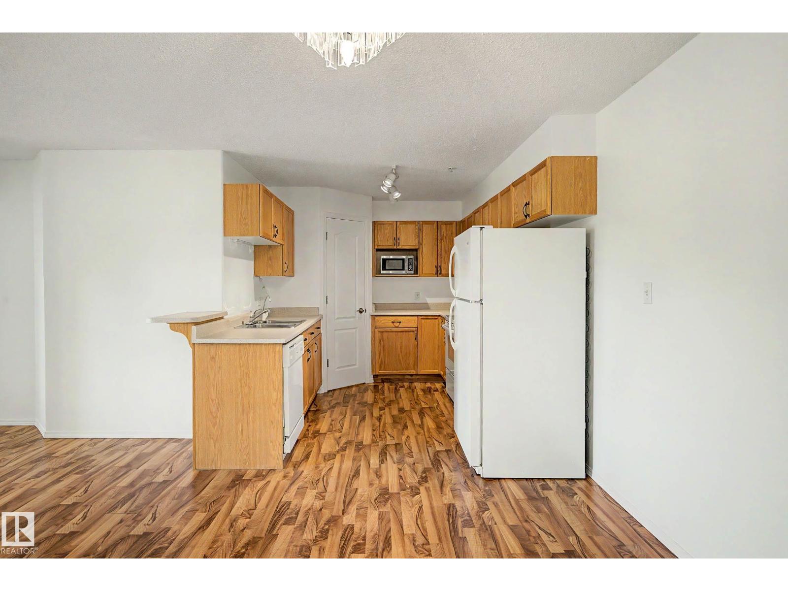 #203 8119 112 AV NW - 5