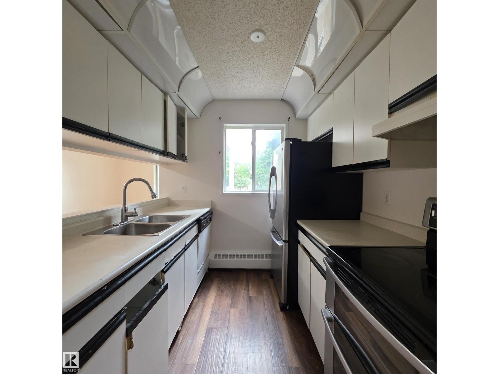 #201 17467 98A AV NW - 11