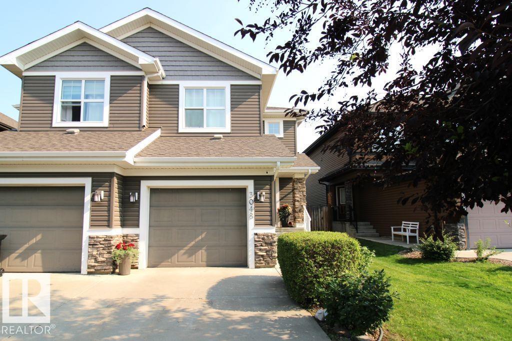 3048 HARVEY CR NW - 2