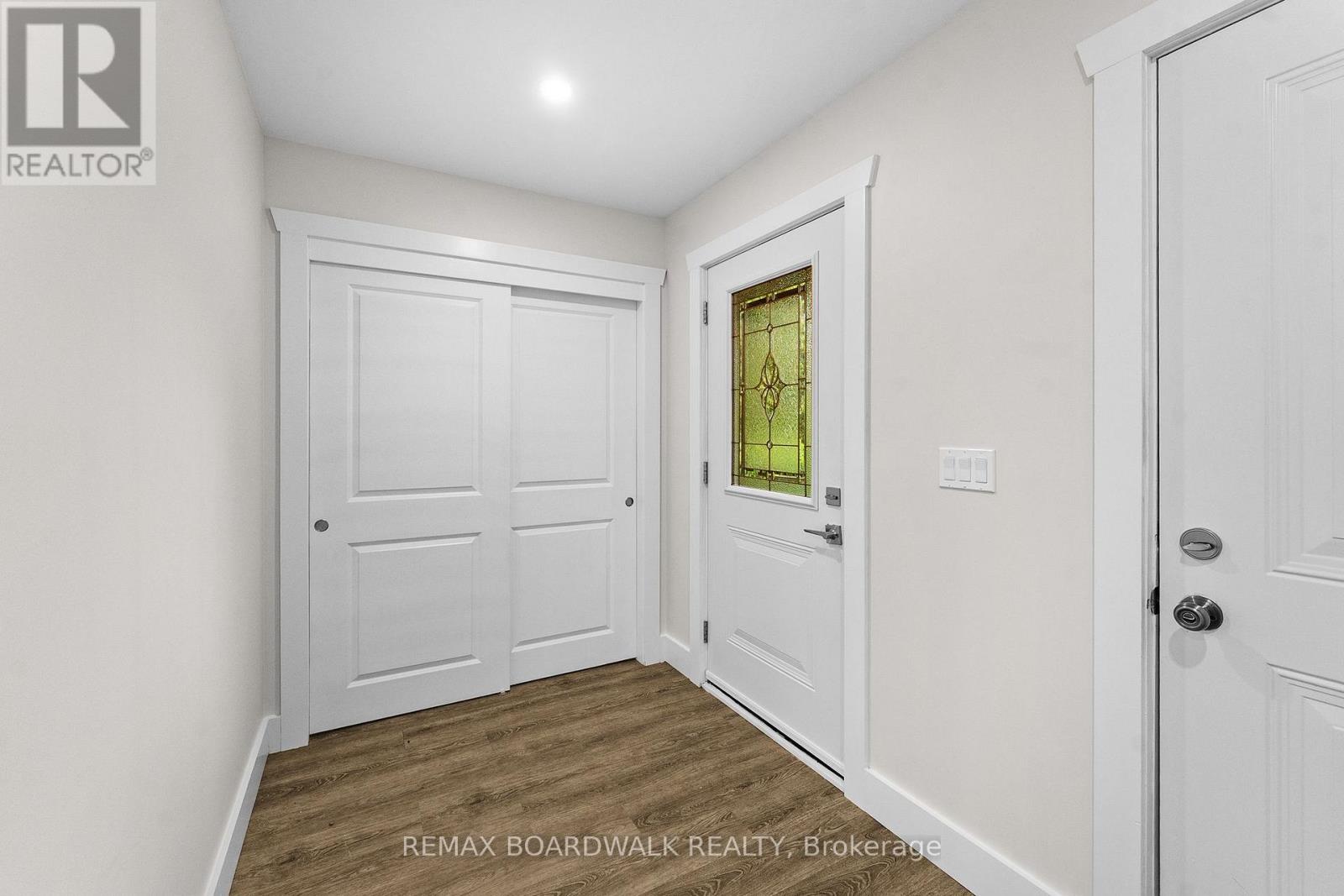 Lovely foyer with extra deep entrance closet
