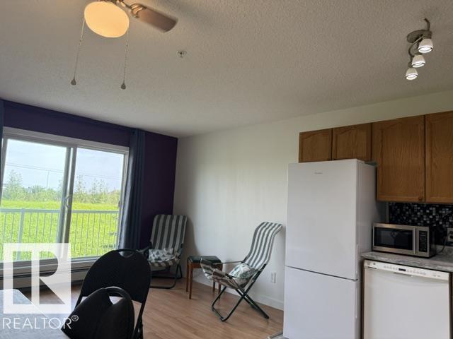 #210 70 WOODSMERE CL - Image 4