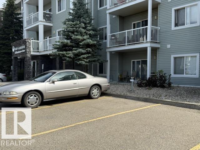 #210 70 WOODSMERE CL - 24