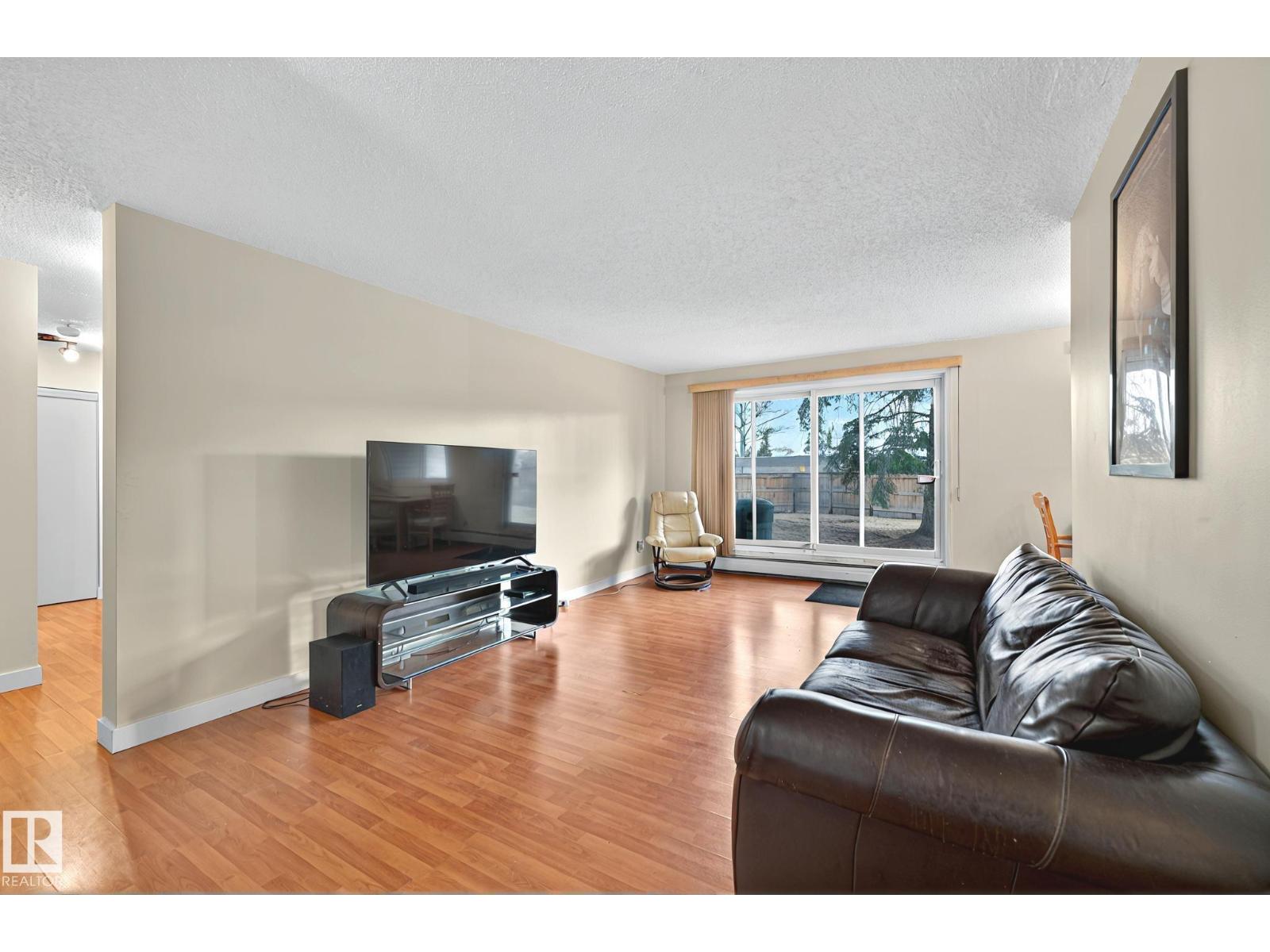 #106 5125 RIVERBEND RD NW - 5