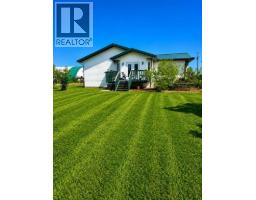 Living room - 74001, 740 Township, High Prairie, AB T0G1E0 Photo 6