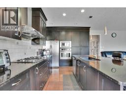 Laundry room - 126 Panatella Crescent Nw, Calgary, AB T3K0M5 Photo 13