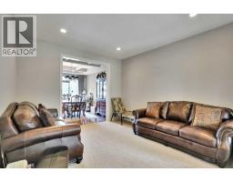 Living room - 126 Panatella Crescent Nw, Calgary, AB T3K0M5 Photo 6