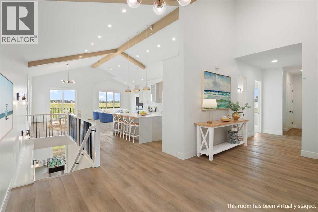 Virtually Staged Entryway to Kitchen/Living/Dining