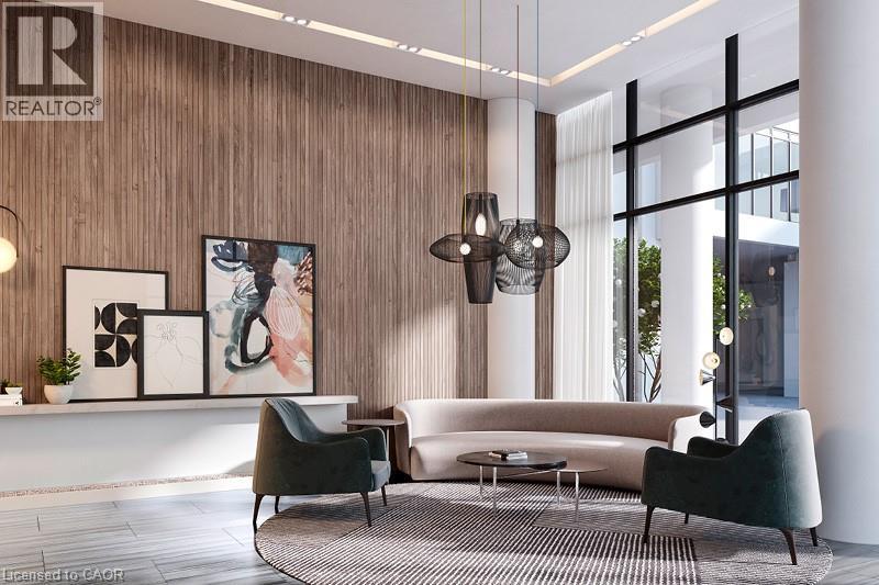 Lobby with a towering ceiling and wooden walls