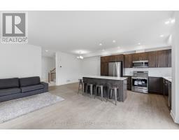 Family room - 300 Ibanez Walk, Ottawa, ON K1T0V7 Photo 11