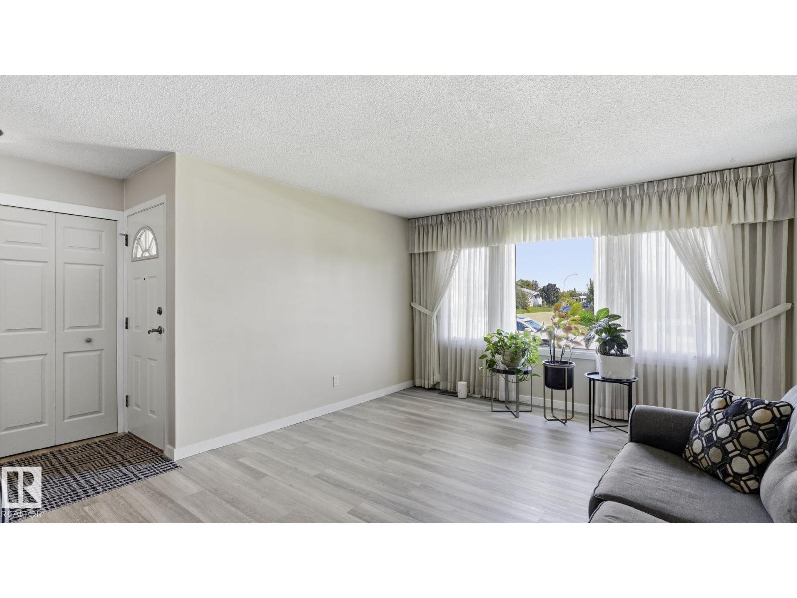 7819 132A AV NW - 7
