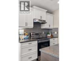 Living room - 220 Sierra Road Sw, Medicine Hat, AB T1B4Y6 Photo 8
