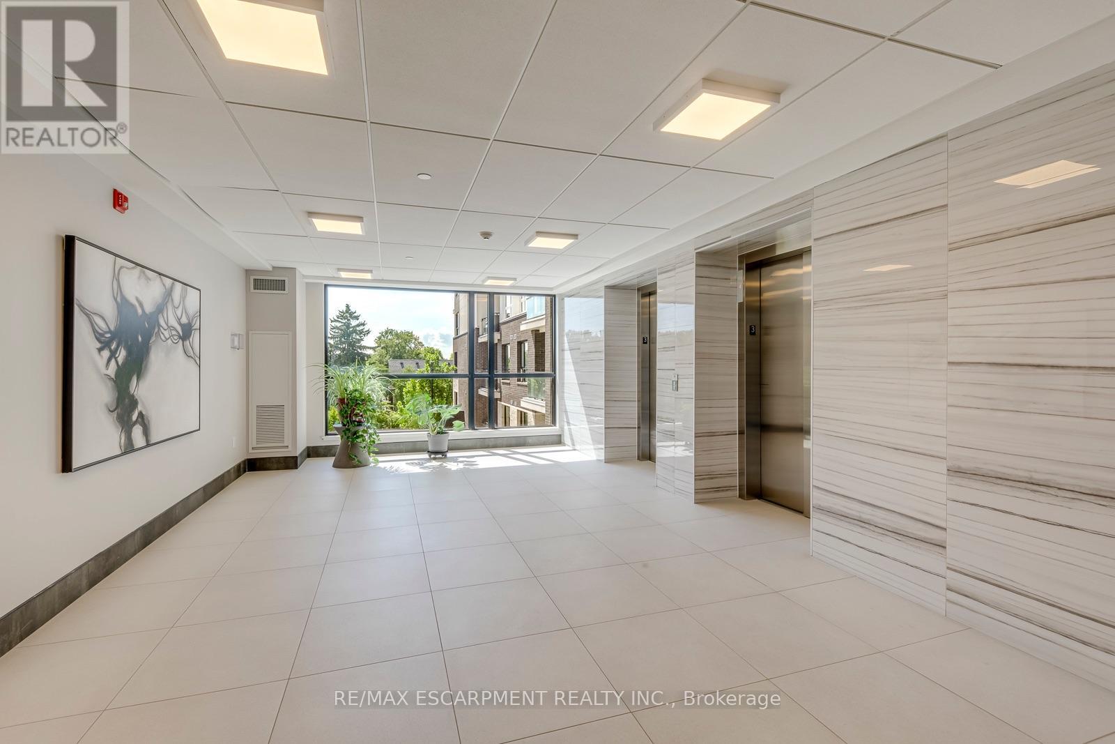 #303 320 PLAINS ROAD E - 7