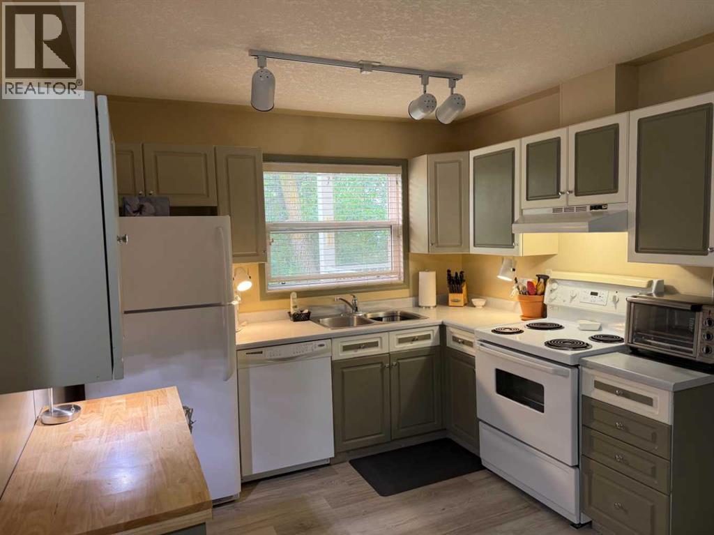 #105 5435 Lakeshore Dr, - 24