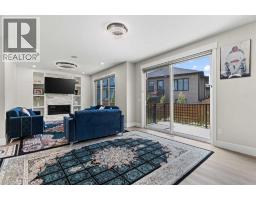 Family room - 34 South Shore Bay, Chestermere, AB T1X2S1 Photo 9
