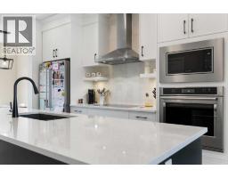 Laundry room - 239 Vista Road, Crossfield, AB T0M0S0 Photo 9