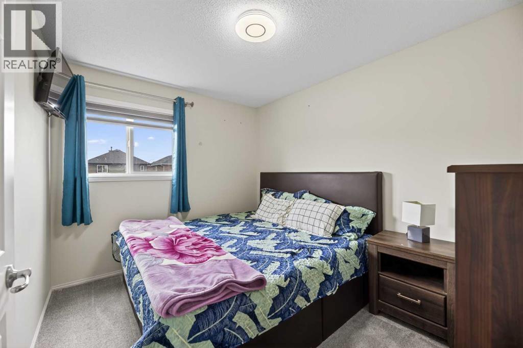 8474 Saddleridge Drive NE - Image 23