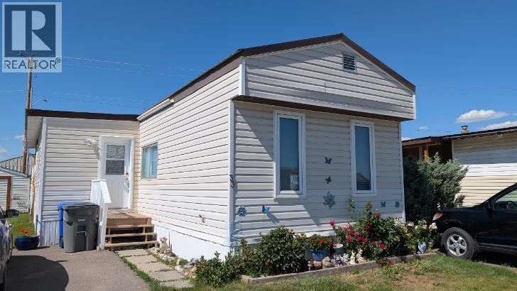 33, 5853 4 Street W - 1