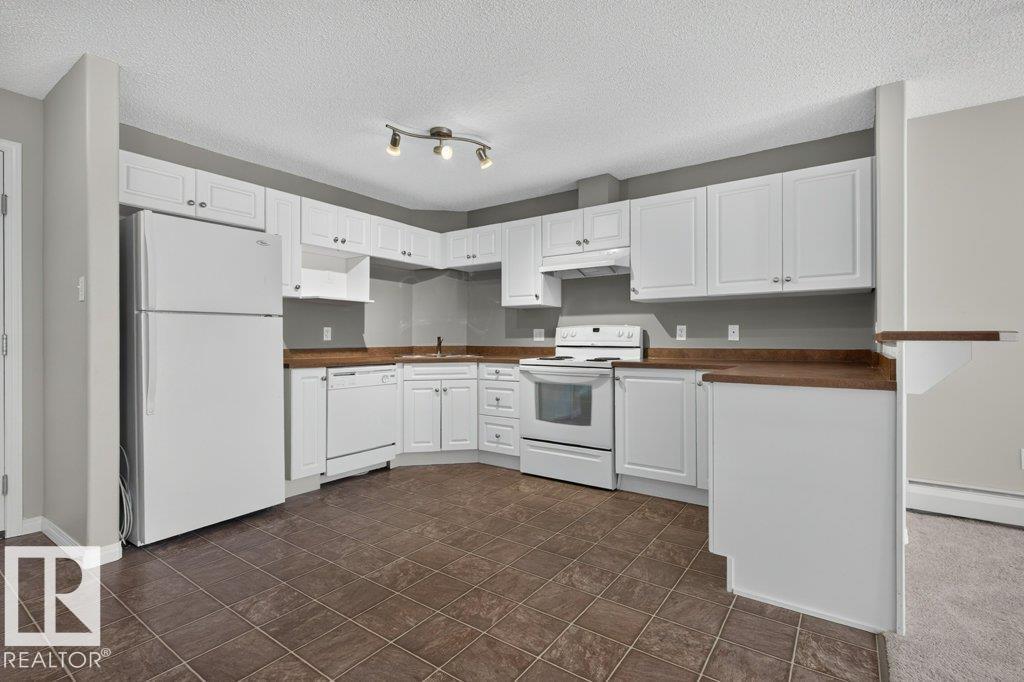 #6215 7331 SOUTH TERWILLEGAR DR NW - 4
