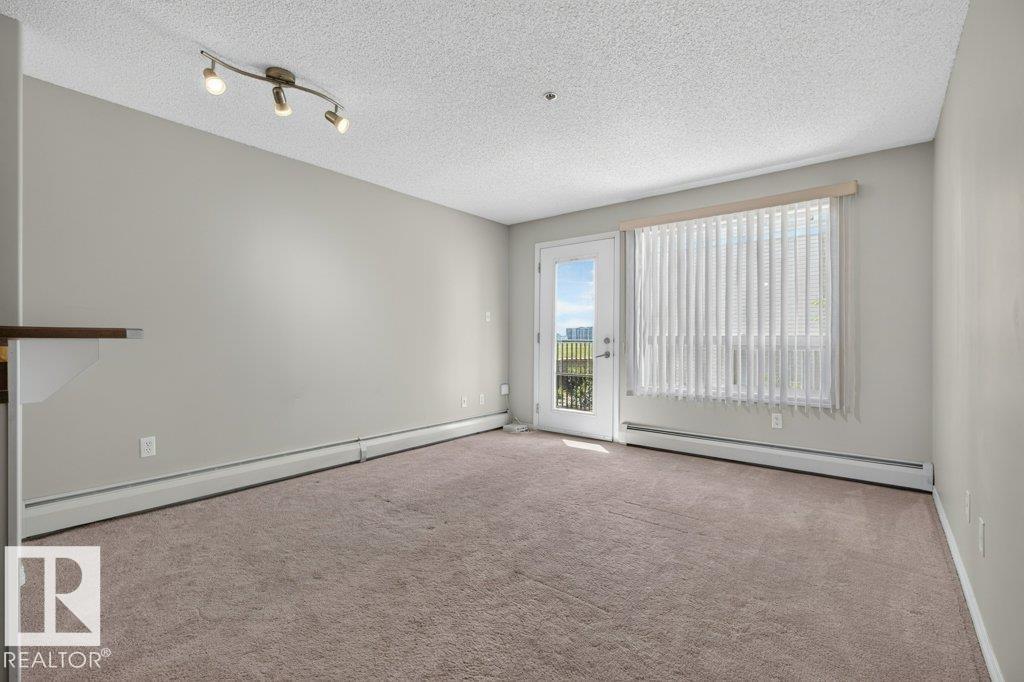 #6215 7331 SOUTH TERWILLEGAR DR NW - 6