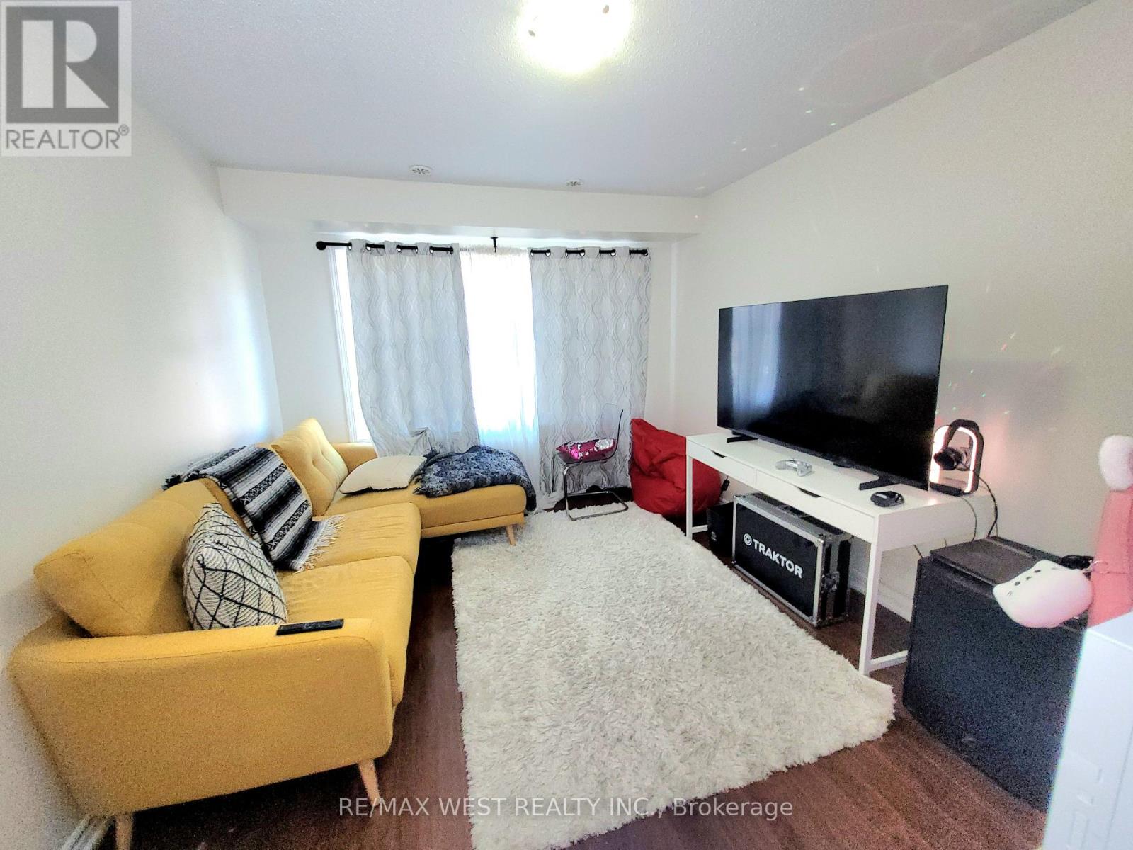 Family room on main floor can be a bedroom
