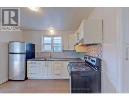 Living room - 80 Lanark Avenue, Toronto, ON M6E2G4 Photo 11