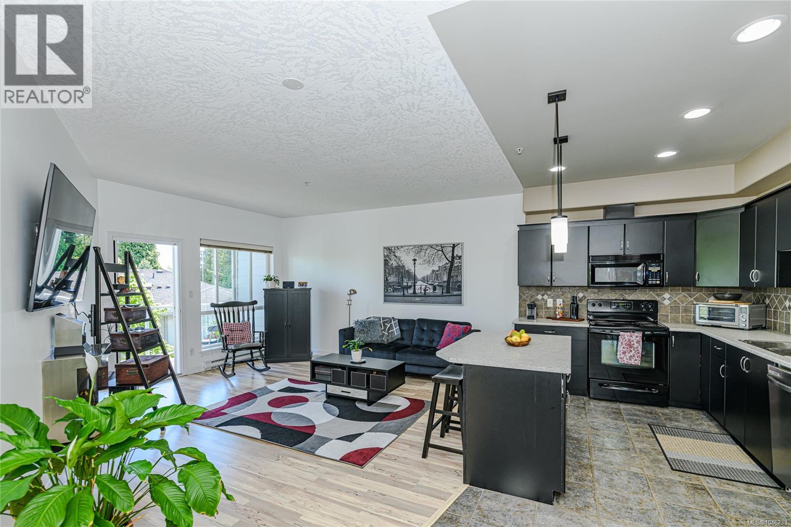 #205 3915 Carey Rd - 1