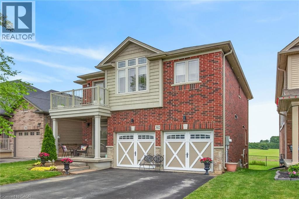 Brick and siding exterior with a two-car garage