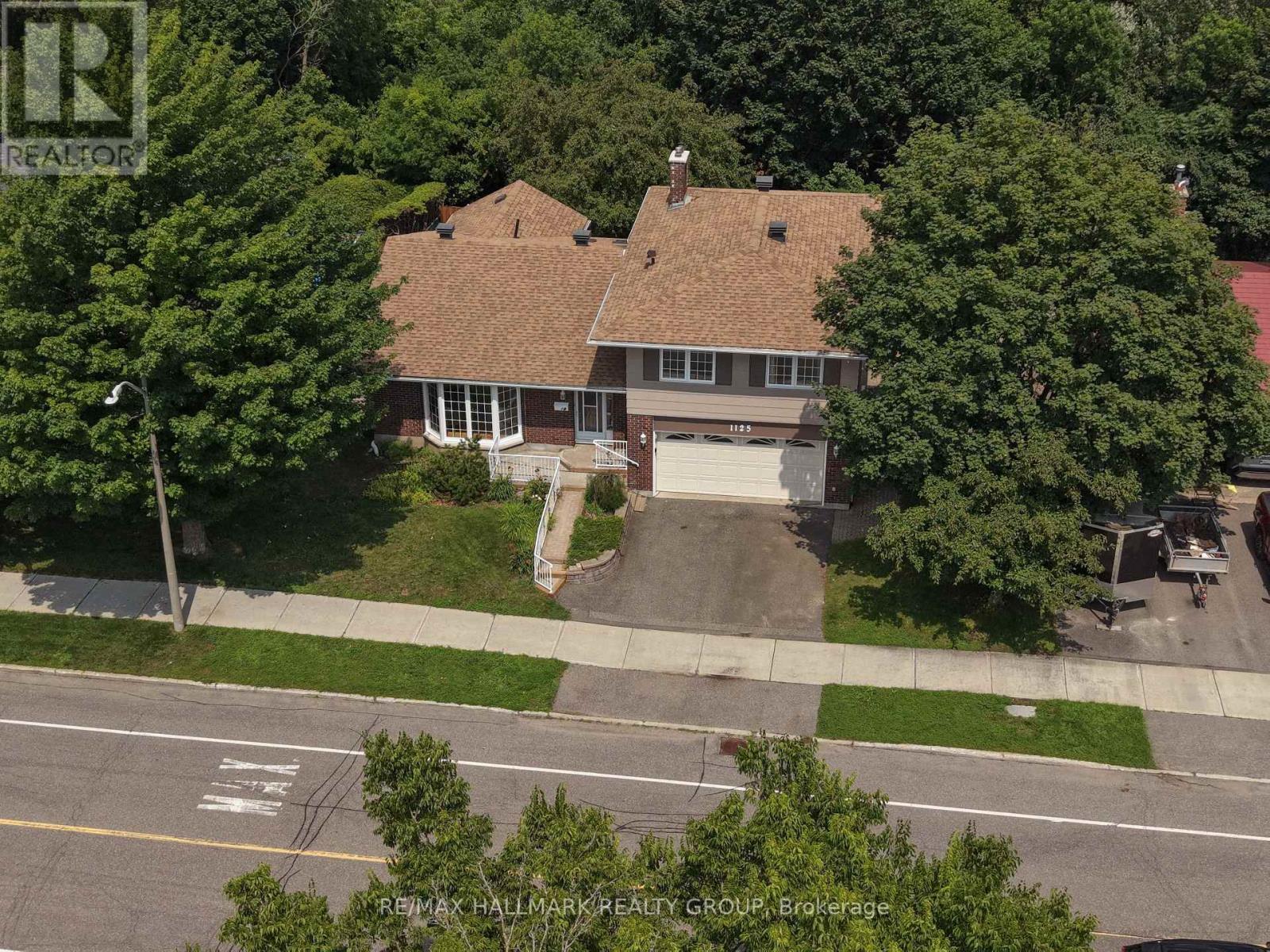 No rear neighbours, street parking and transit.