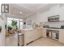 208 - 123 Maurice Drive, Oakville, ON L6K2W6 Photo 10