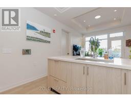 208 - 123 Maurice Drive, Oakville, ON L6K2W6 Photo 12