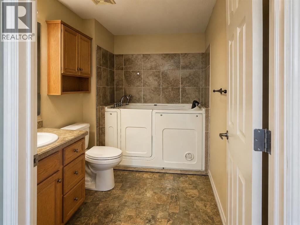 #406 4425 HERITAGE Way - Image 14