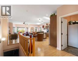 Living room - 504 Harrison Court, Crossfield, AB T0M0S0 Photo 6