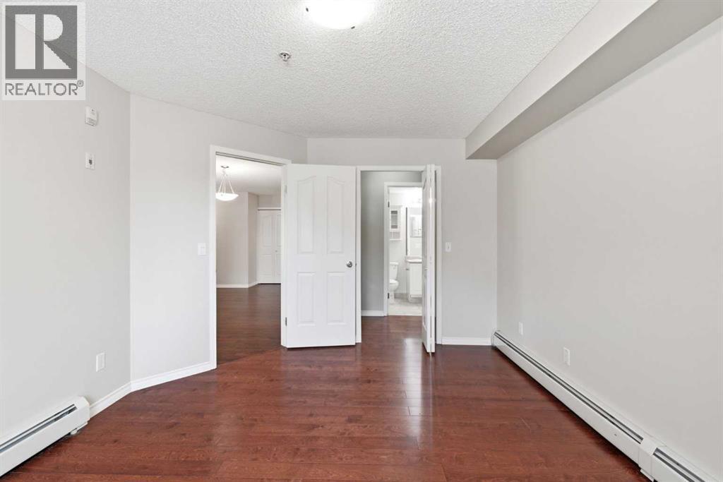 #102 17 Country Village Bay NE - 9